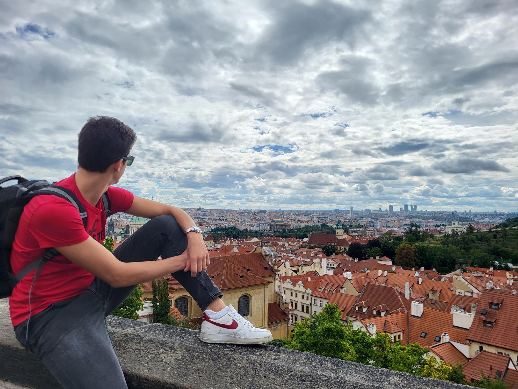 Lorenzo Moni staring at the landscape from Prague Castle